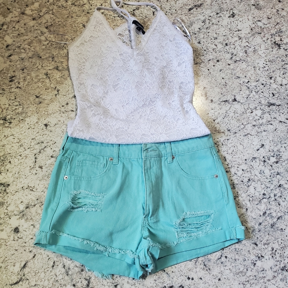 Teal distressed shorts